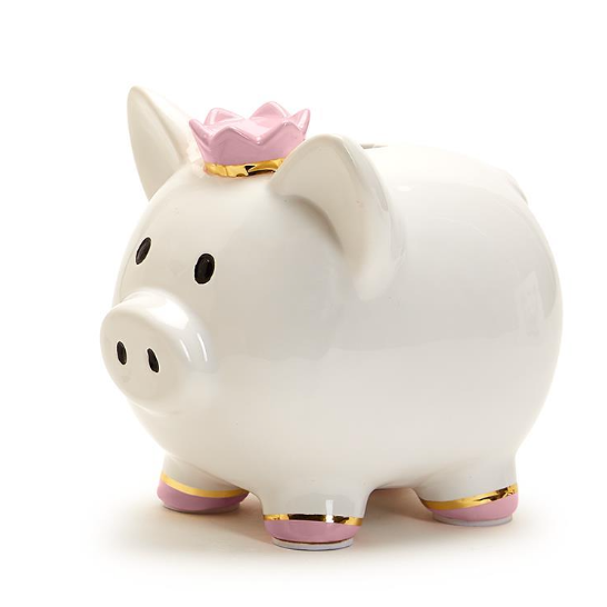 White piggy bank with a pink crown on a white background