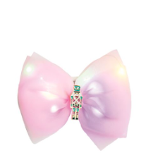 Large pink bow with a colorful center on a white background