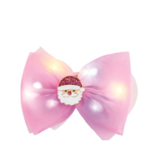 Pink bow with LED lights on a white background