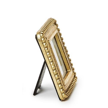 Gold decorative picture frame on a white background