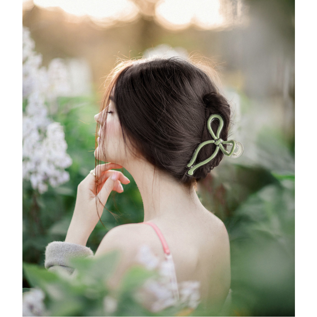 Woman with a decorative hair clip in an outdoor setting