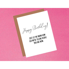 Birthday card with humorous text on a pink background